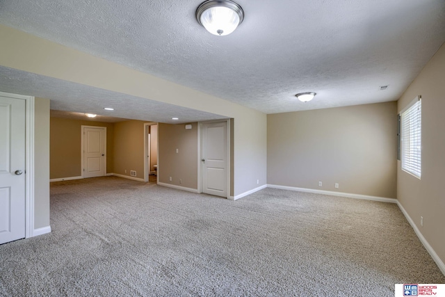 1215 Turtle Creek Rd, Lincoln, NE 68521 - carpeted empty room featuring a textured ceiling and baseboards