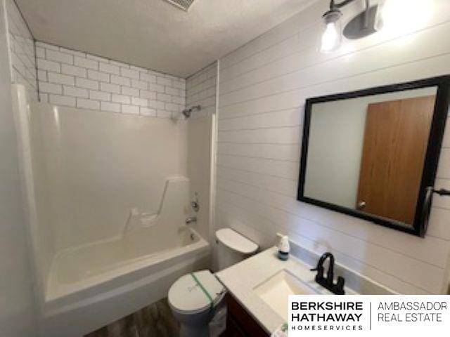 220 Orchard Pl, Hickman, NE 68372 - full bathroom featuring vanity and  shower combination