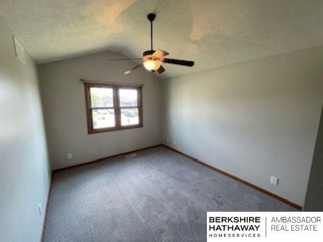 220 Orchard Pl, Hickman, NE 68372 - spare room with a ceiling fan, lofted ceiling, and carpet flooring