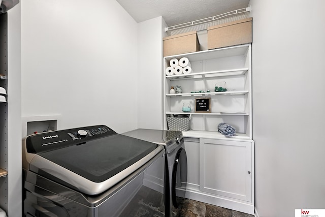 20459 C St, Omaha, NE 68022 - washroom featuring washing machine and dryer and stone finish floors