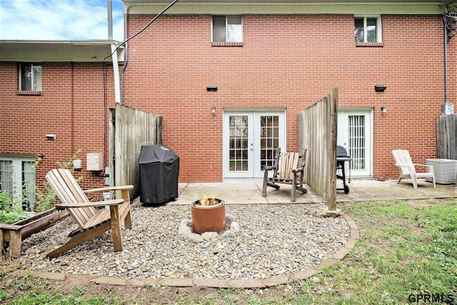 1913 Winnie Dr Unit 5, Bellevue, NE 68005 - back of property with a patio area and brick siding