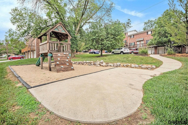 1913 Winnie Dr Unit 5, Bellevue, NE 68005 - view of playground with a lawn