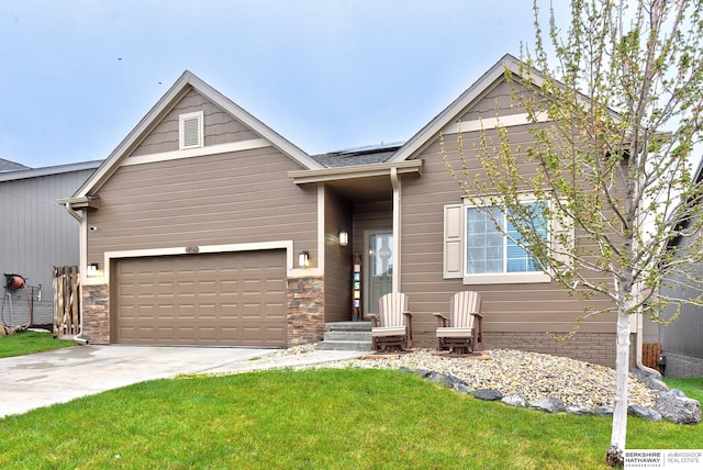 14562 Potter Cir, Bennington, NE 68007 - view of front of property with concrete driveway and a front yard