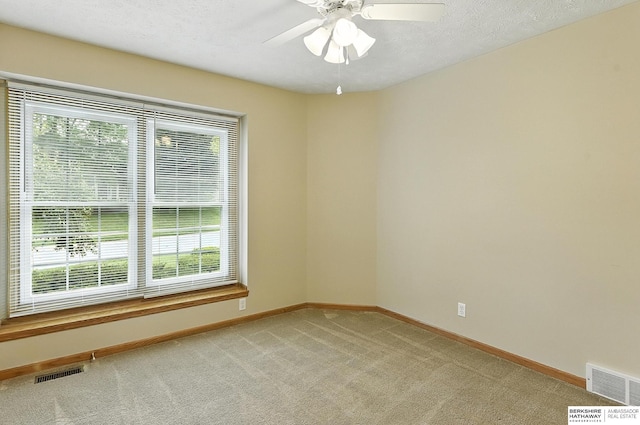 1422 N 155th Ave, Omaha, NE 68154 - empty room with light carpet and a ceiling fan