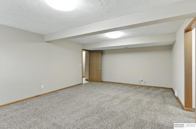 1422 N 155th Ave, Omaha, NE 68154 - finished below grade area with light colored carpet and a textured ceiling
