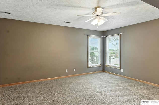 1422 N 155th Ave, Omaha, NE 68154 - carpeted empty room with ceiling fan and a textured ceiling
