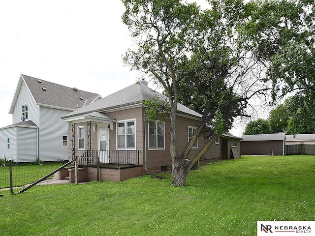 95 S Irving St, Fremont, NE 68025 - back of house featuring crawl space and a lawn