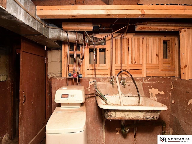 95 S Irving St, Fremont, NE 68025 - unfinished basement featuring a water softener