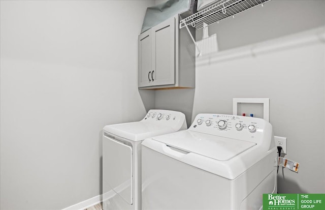 13512 S 55th St, Papillion, NE 68133 - washroom featuring washing machine and clothes dryer and cabinet space
