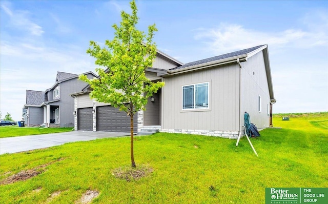 13512 S 55th St, Papillion, NE 68133 - view of front facade with concrete driveway, a front yard, and an attached garage