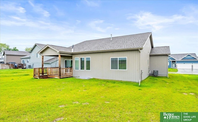 13512 S 55th St, Papillion, NE 68133 - rear view of house featuring a deck, a yard, and roof with shingles