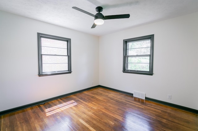 3018 S 42nd St, Lincoln, NE 68506 - spare room featuring hardwood / wood-style flooring and ceiling fan