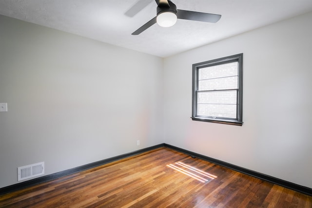 3018 S 42nd St, Lincoln, NE 68506 - unfurnished room with wood finished floors and ceiling fan