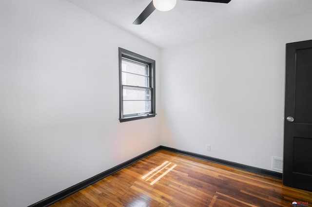 3018 S 42nd St, Lincoln, NE 68506 - empty room with ceiling fan and wood finished floors