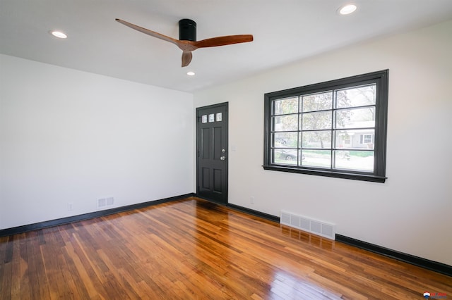 3018 S 42nd St, Lincoln, NE 68506 - empty room with ceiling fan, wood-type flooring, and recessed lighting