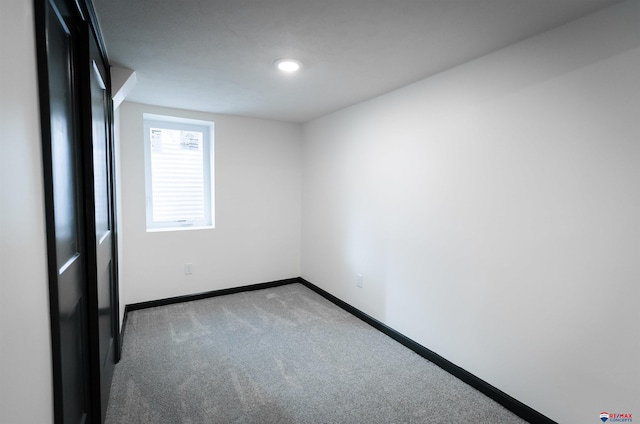 3018 S 42nd St, Lincoln, NE 68506 - carpeted empty room featuring baseboards and recessed lighting