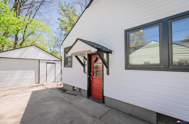 3018 S 42nd St, Lincoln, NE 68506 - entrance to property featuring a garage and driveway