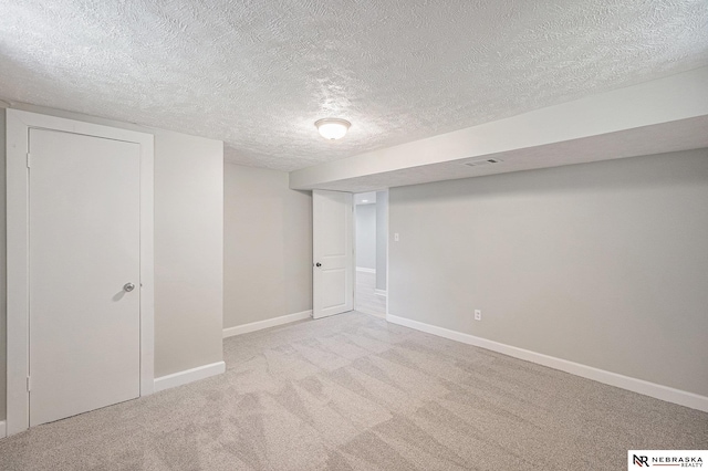 1409 Nelson Ln, Fremont, NE 68025 - finished below grade area featuring carpet flooring and a textured ceiling