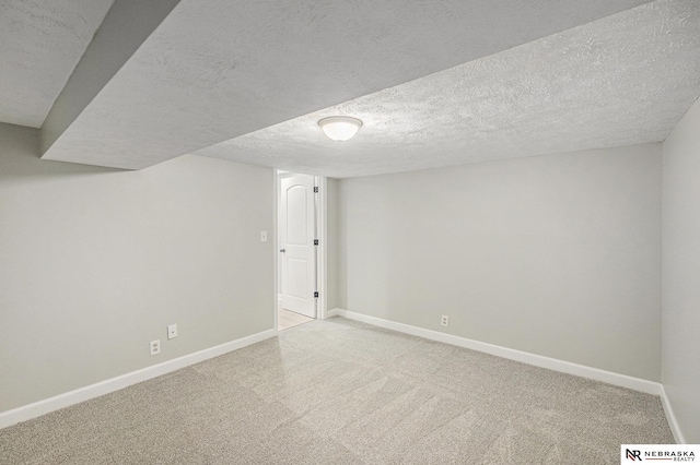 1409 Nelson Ln, Fremont, NE 68025 - finished below grade area with carpet floors and a textured ceiling