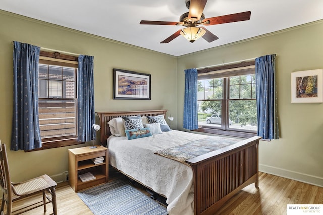 6024 Poppleton Ave, Omaha, NE 68106 - bedroom with wood finished floors and ceiling fan