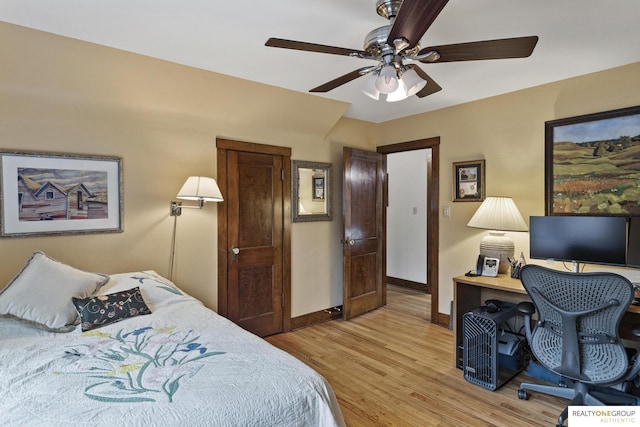 6024 Poppleton Ave, Omaha, NE 68106 - bedroom featuring light wood-style floors, a ceiling fan, and an office area