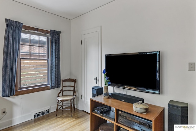 6024 Poppleton Ave, Omaha, NE 68106 - living room featuring wood finished floors and baseboards