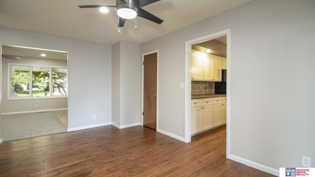 4211 S 36th St, Lincoln, NE 68506 - empty room featuring a ceiling fan, dark wood-style flooring, and recessed lighting