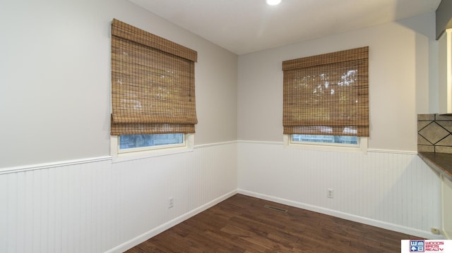 4211 S 36th St, Lincoln, NE 68506 - empty room with wainscoting and wood finished floors