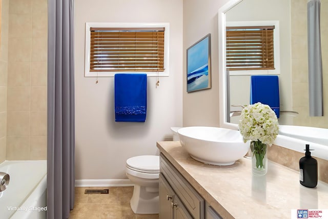 4211 S 36th St, Lincoln, NE 68506 - bathroom with double vanity, tile patterned floors, and shower / tub combo