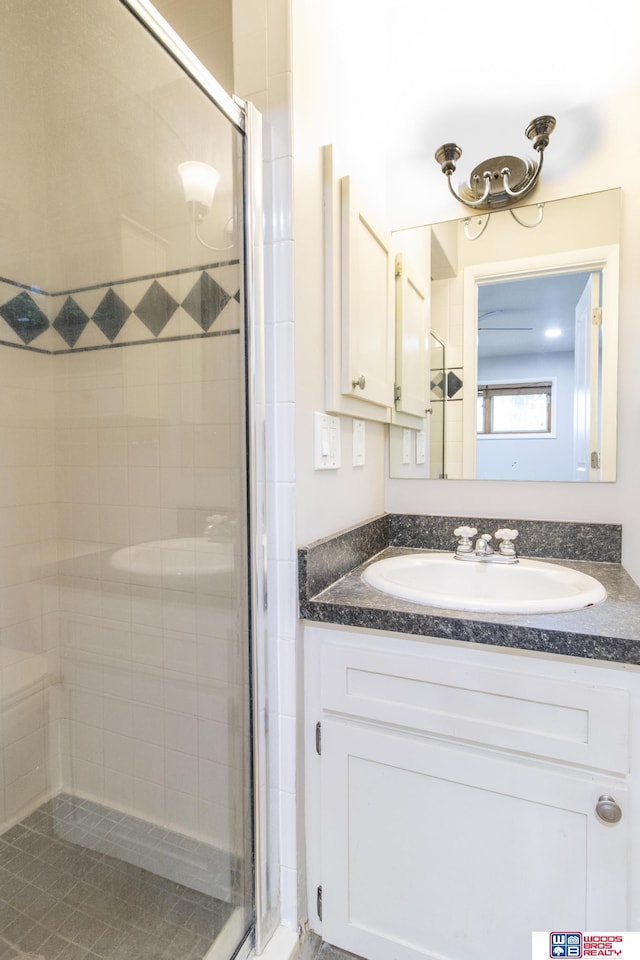 4211 S 36th St, Lincoln, NE 68506 - full bath with a stall shower and vanity