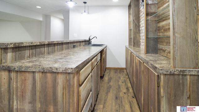 4211 S 36th St, Lincoln, NE 68506 - indoor wet bar with dark wood-style flooring, recessed lighting, and decorative light fixtures