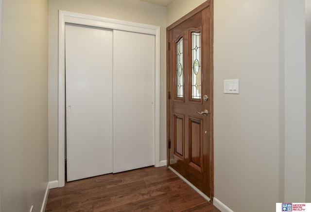 4211 S 36th St, Lincoln, NE 68506 - foyer with dark wood-type flooring and baseboards