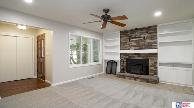 4211 S 36th St, Lincoln, NE 68506 - unfurnished living room featuring carpet floors, a ceiling fan, recessed lighting, and built in features