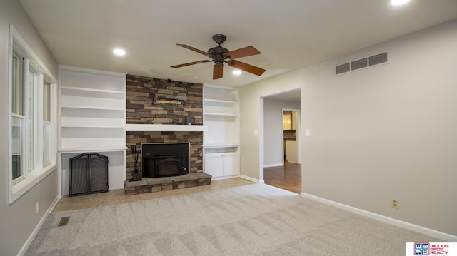 4211 S 36th St, Lincoln, NE 68506 - unfurnished living room featuring a fireplace, a ceiling fan, carpet floors, and recessed lighting