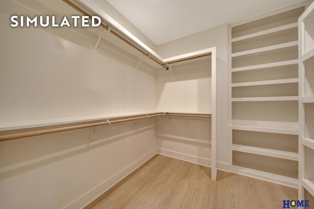 640 Eloise Ave, Lincoln, NE 68520 - walk in closet featuring wood finished floors