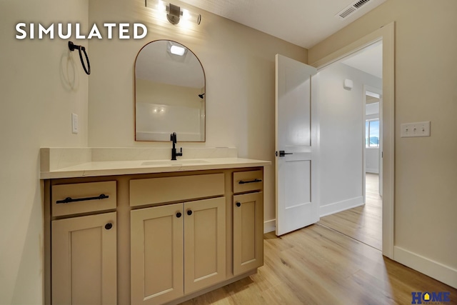 640 Eloise Ave, Lincoln, NE 68520 - bathroom with vanity and wood finished floors