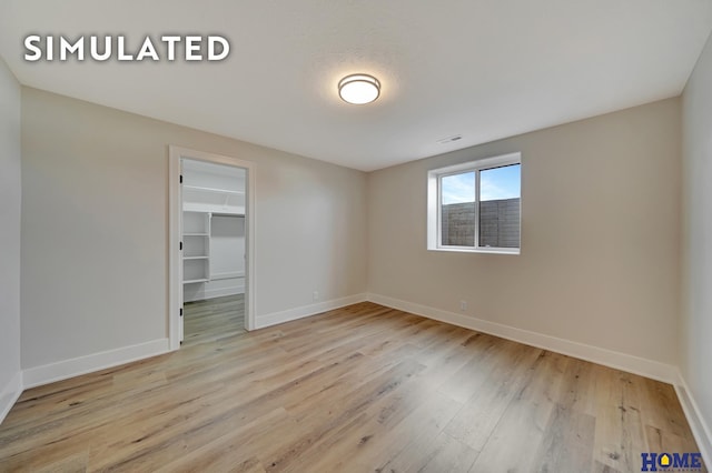 640 Eloise Ave, Lincoln, NE 68520 - empty room with wood finished floors and baseboards