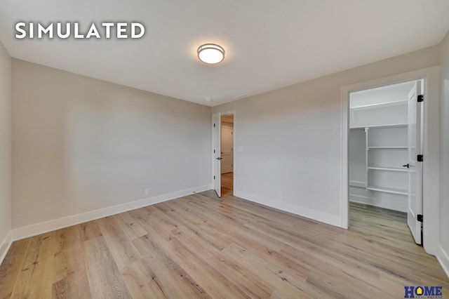 640 Eloise Ave, Lincoln, NE 68520 - empty room featuring wood finished floors and baseboards