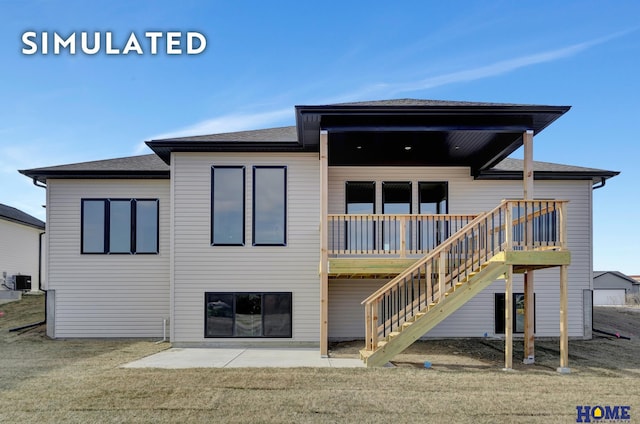 640 Eloise Ave, Lincoln, NE 68520 - back of property featuring stairs, a shingled roof, a wooden deck, and a lawn