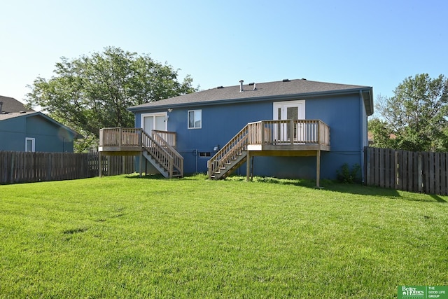 2412 Lewis And Clark Rd, Bellevue, NE 68123 - back of house featuring stairs, a fenced backyard, and a wooden deck