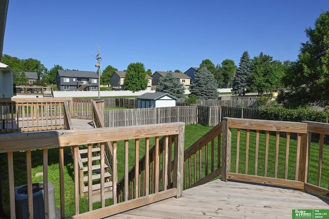 2412 Lewis And Clark Rd, Bellevue, NE 68123 - deck featuring a fenced backyard, stairs, and a residential view