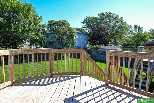 2412 Lewis And Clark Rd, Bellevue, NE 68123 - deck with a fenced backyard