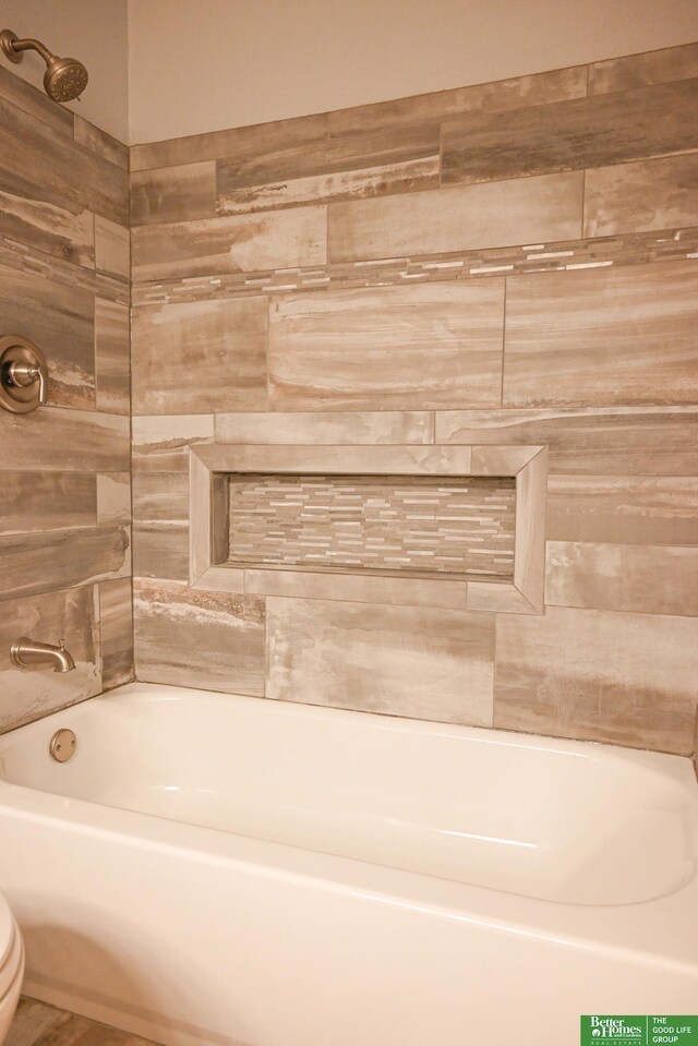 2412 Lewis And Clark Rd, Bellevue, NE 68123 - bathroom with toilet and bathing tub / shower combination