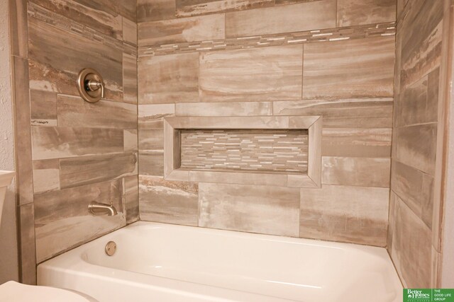 2412 Lewis And Clark Rd, Bellevue, NE 68123 - bathroom with bathing tub / shower combination and toilet