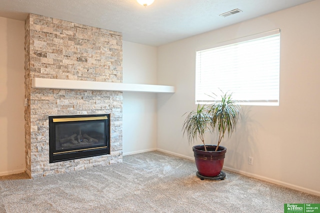 2412 Lewis And Clark Rd, Bellevue, NE 68123 - detailed view of a stone fireplace and carpet floors