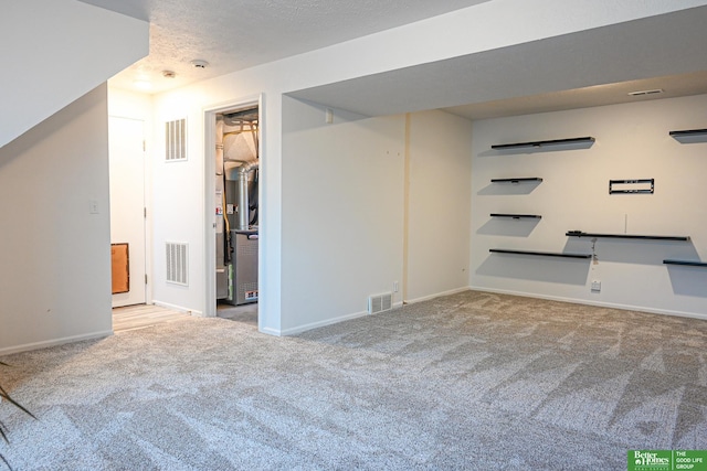 2412 Lewis And Clark Rd, Bellevue, NE 68123 - finished basement with carpet and a textured ceiling