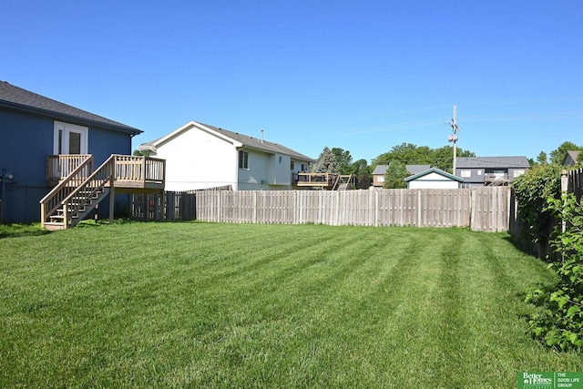 2412 Lewis And Clark Rd, Bellevue, NE 68123 - view of yard featuring stairway and a wooden deck