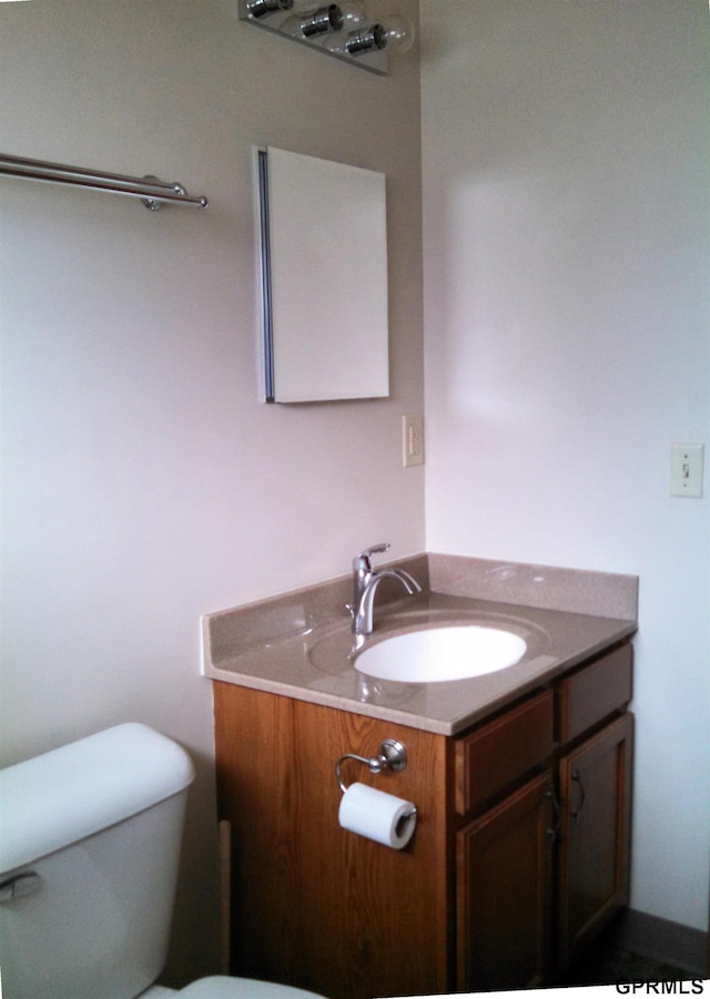 1321 D St, Lincoln, NE 68502 - half bathroom with vanity and toilet