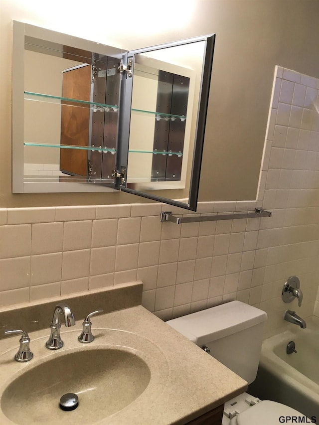 1321 D St, Lincoln, NE 68502 - full bath with vanity, shower / washtub combination, and tile walls