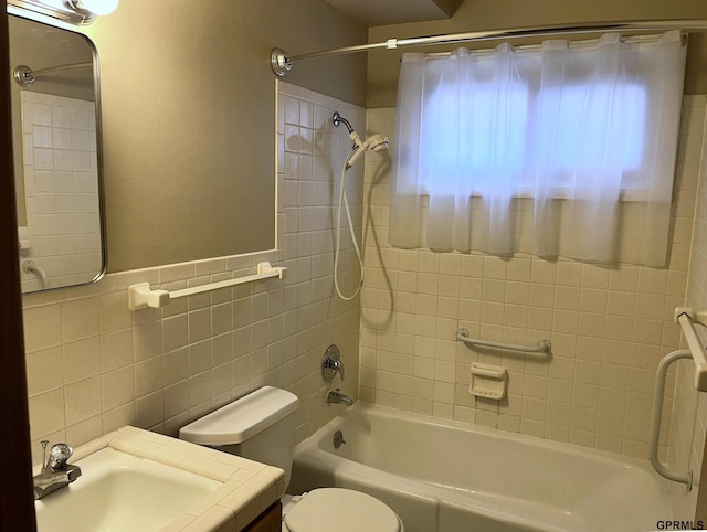 1321 D St, Lincoln, NE 68502 - full bath featuring shower / bathtub combination, tile walls, and vanity